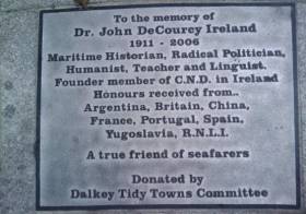 The plaque dedicated to the memory of the work of the late Dr. John de Courcy Ireland is located at Coliemore Harbour, Dalkey where he was a resident of the Dublin suburb   