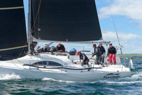 Black is beautiful – and fast. Rob McConnell’s A35 Fool’s Gold (Waterford Harbour SC) powers her way to a clean sweep of the Sovereigns Cup at Kinsale last week with the latest in UK McWilliam sails. Graham Curran of the sailmakers is trimming the headsail