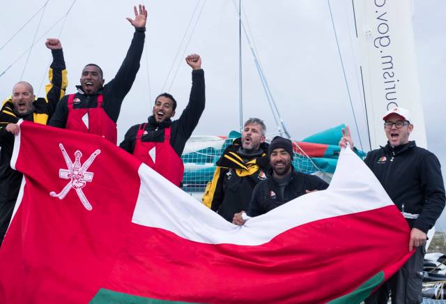 Dawn of a great new era. Damian Foxall (left) and Sidney Gavignet (centre) and their shipmates from Musandan-Oman in he early morning in Wicklow today after taking line honours in the Volvo Round Ireland Race 2016 and shattering the boats’s own Round Ireland Record established in May 2015.    