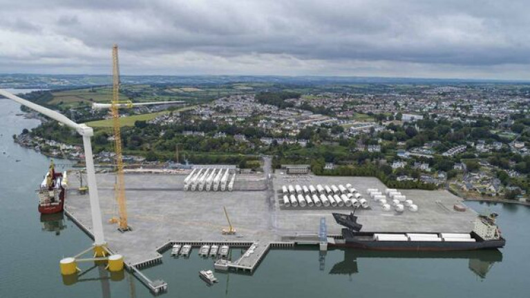 An artist&#039;s impression of how the Doyle Shipping Group&#039;s dockyard (former shipyard of Verolme Cork Dockyard) in Cork Harbour, could be used as a major hub for the delivery and assembly of offshore wind turbines. AFLOAT adds as part of the proposed redevelopment at Rushbrooke, west of Cobh, is a ro-ro linkspan, to discharge wind farm components from a specialist vessel with an extra height raised bow visor to enable such large scale project cargo on board. 