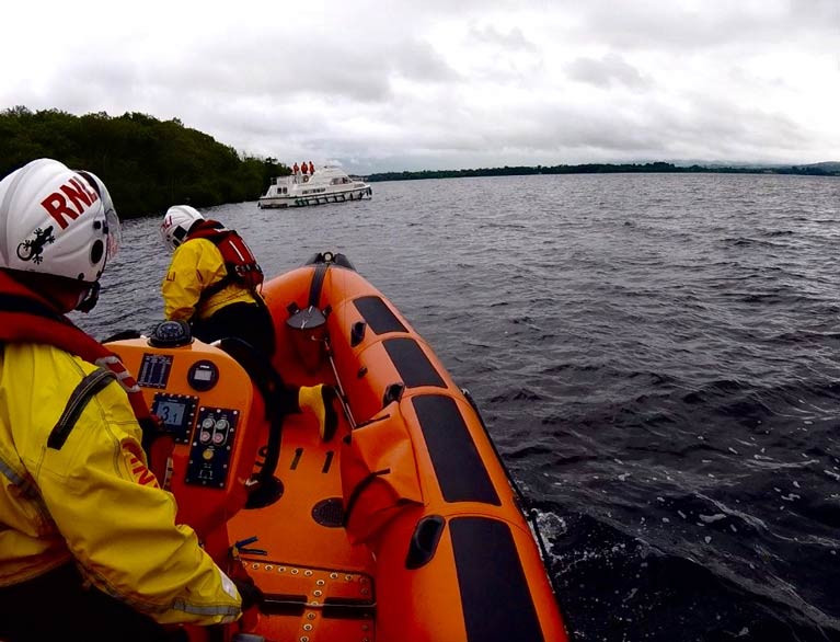 Using navigation charts and taking depth soundings, the Lough Derg lifeboat made a careful approach to the cruiser 