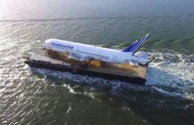 The Boeing 767 bound for Enniscrone on its barge in the Shannon Estuary