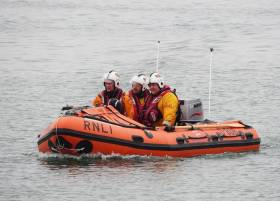 Wicklow’s inshore lifeboat crew bring the casualty ashore
