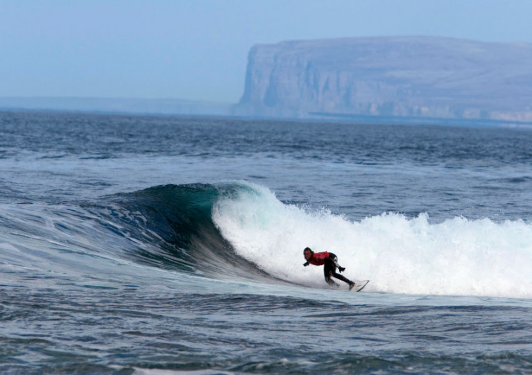 File image of a surfer at Brims Ness near Thurso in the Scottish Highlands