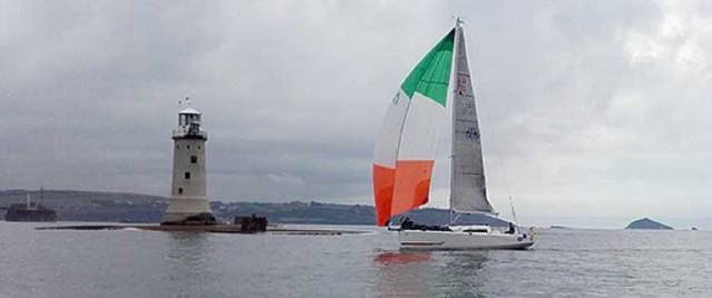 Conor Fogerty's Sunfast 3200 'Bam' crossing the line of the OSTAR qualifying race, the Solo Fastnet in 2016