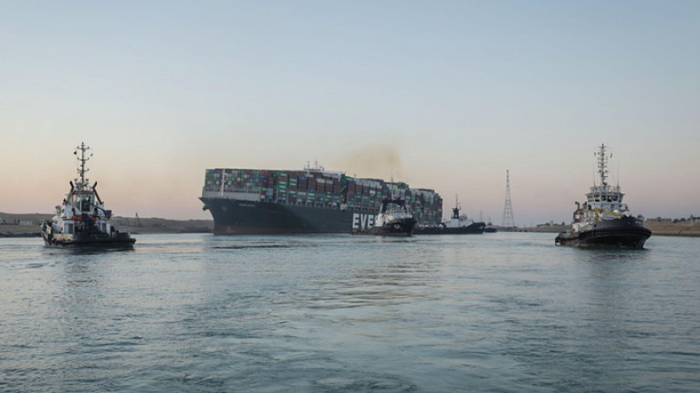 After months of wrangling, the 20,000 (TEU) capacity giant containeship Ever Given (in March) will finally get underway again from the Suez Canal this Wednesday, 7 July. AFLOAT has tracked the vessel today at anchor in the Great Bitter Lake of the canal which is critical to global trade. 