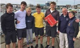 The successful Cork Institute of Technology team at the Student Yachting Selection Trials at Howth over the weekend were (left to right) Ewan O’Keeffe, Mark Murphy, Morgan Knight, Harry Durcan (helmsman) and Grattan Roberts, with Commodore Ian Byrne HYC, and Race Officer Scorie Walls