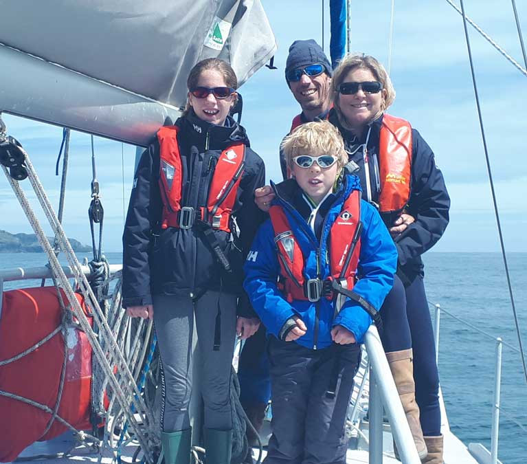 Danu’s crew find their first sunshine as they depart from Ireland in late June 2019