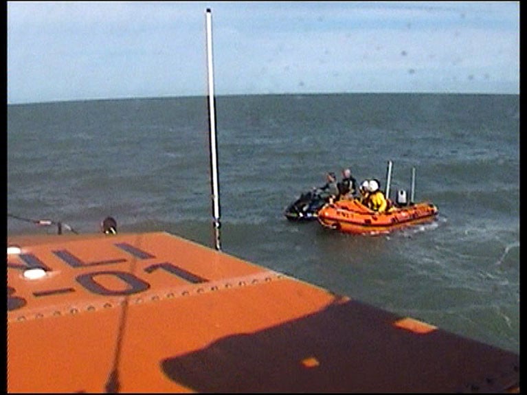 A video still of Wicklow all-weather lifeboat and Inshore lifeboat with the Jet ski off Brittas