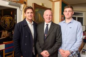 Ryan Seaton (left) with Royal Cork Yacht Club Rear Admiral Stephen O&#039;Shaughnessy (centre) and Seafra Guilfoyle