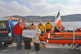 Clifden RNLI members Andrew Bell, Ciaran Folan, David Coyne, Barry Ward and John Brittain accept a cheque for €1,820 from Jacqueline Hannon and Nancy Duffy on St Patrick’s Day