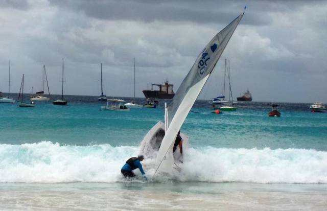 A GP14 is launched off the beach at Barbados Yacht Club in the build up to the World Championships on Monday. 23 Irish boats are competing.
