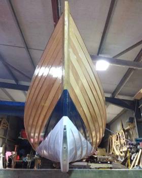 St. Michael’s Rowing Club&#039;s new skiff the Gráinne Mhaol being released from the workshop in Cornwall