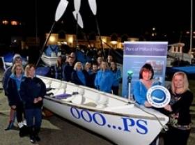 Anna Malloy, PR &amp; Communications Manager at the Port of Milford Haven, with Pembrokeshire Yacht Club members