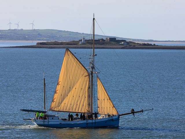  Ilen in search of wind as she heads seaward past Scattery Island in the Shannon Estuary