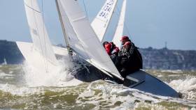 Fully powered up, punching through the Solent chop – big breeze arrived for today&#039;s Etchells World Championship race