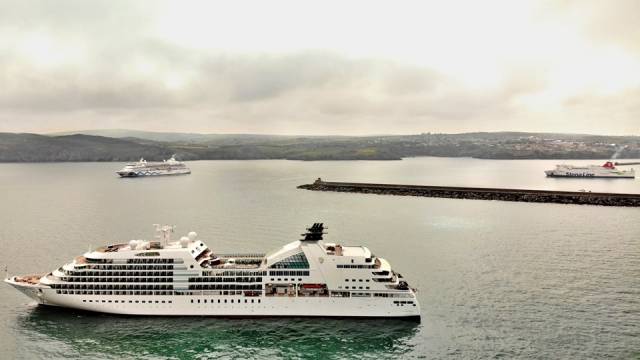 When Three Becomes A Crowd: Stena Nordica within the Port of Fishguard and where cruiseship AIDAvita (left) is a scheduled caller to the Welsh port. Whereas Seabourn Quest (foreground) made a call to the scenic Pembrokeshire location at short notice and also took anchorage offshore. 