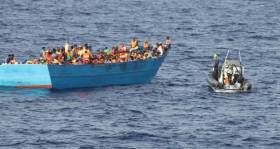 Migrants rescued from the barge by LE Samuel Beckett northeast of the Libyan capital