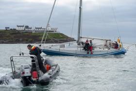 RCYC&#039;s Kieran O&#039;Connell (in RIB) assists Winter league competitor Blue Oyster that went aground yesterday in Cork Harbour. Race three photo gallery below