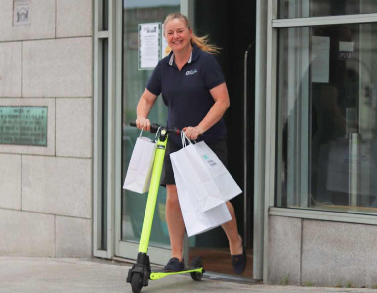 Viking Marine's Antonia with a batch of customer orders for delivery on the shop's electric scooter 