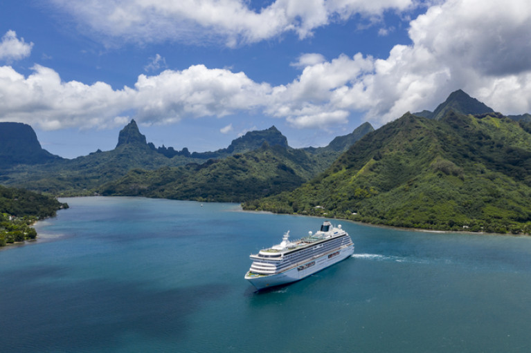 A cruiseship in Tahitian waters, however in 2022 cruise visitors won’t be calling on board some of the industry’s largest mega cruise ships.