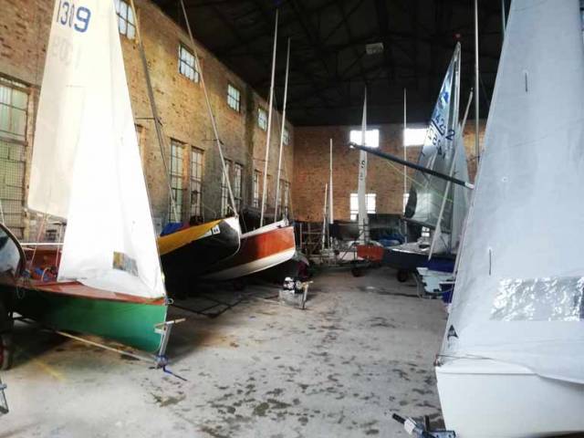 GP14s stored in the LEYC boat shed with their sails still up....
