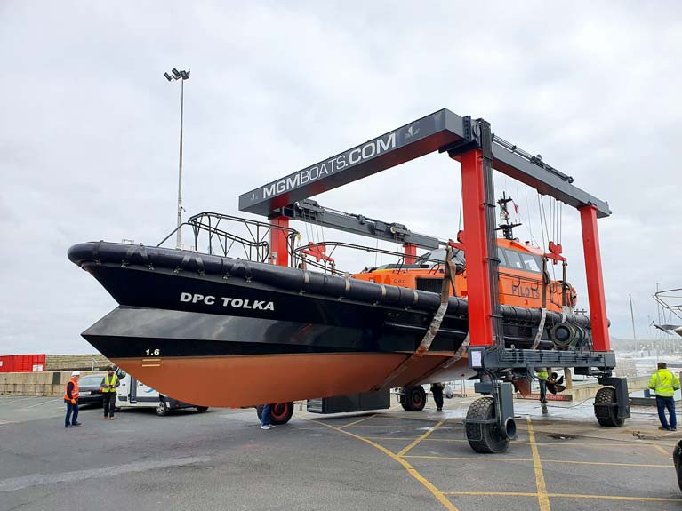 Dublin Pilot boat Tolka's underwater hull shape is clearly visible on the MGM Boats Travel Hoist at Dun Laoghaire. The vessel's ability to handle high speeds in bad weather is due to an innovative beak bow design which can steady the hull of the boat as it pitches into the sea.