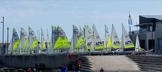 Part of the 38–boat fleet of RS Fevas waiting for wind on the second day of the National Championships at Greystones Sailing Club in County Wicklow