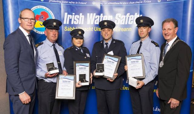 Simon Coveney TD, Minister for Housing, Planning & Local Government with 'Seiko Just In Time Award' recipients Sergeant Kieran O Regan, Gardai Claire Murphy, Mark Holden, Kieran Hayes (Tipperary) and Martin O'Sullivan, Chairman of Irish Water Safety at the annual Irish Water Safety Awards held at Dublin Castle.