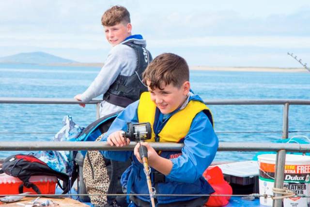 Matthew Moran and Oisin Fynes of Newport Sea Angling Club in action during a fishing trip in 2018