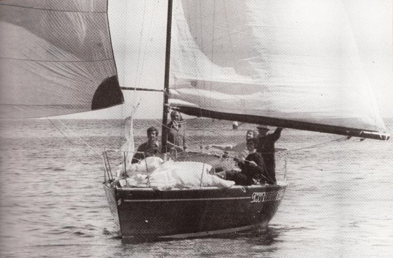 The late Bruce Lyster (on left) as his hugely successful Half Tonner Swuzzlebubble finishes first in the late August 1980 Abersoch-Howth Race to add the ISORA Championship Title to a season of national and international success