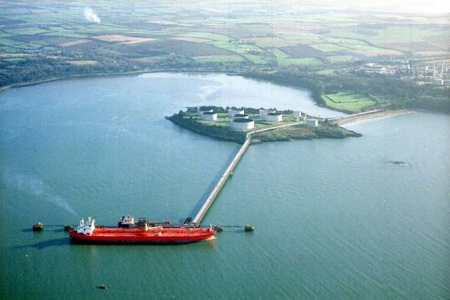 Tankers berthed at the jetty of the State's sole oil refinery at Whitegate in lower Cork Harbour has been sold to a Canadian company