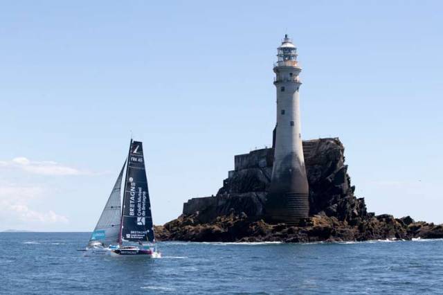 Tom Laperche, skipper of the Figaro yacht Bretagne passes the Fastnet Rock on his way to the Kinsale finish