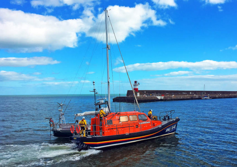 Wicklow RNLI’s all-weather lifeboat towing the yacht into harbour