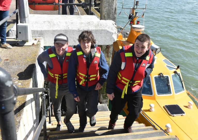 Three of the Irish crew from the SV Tenacious arrive in Cobh