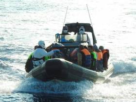 A rigid inflatable boat (RIB) of the LE James Joyce with migrants rescued on board
