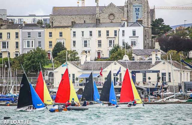 Firefly dinghy racing in front of the National Yacht Club. The Dun Laoghaire Harbour club will celebrates its 150th birthday next June with a special regatta