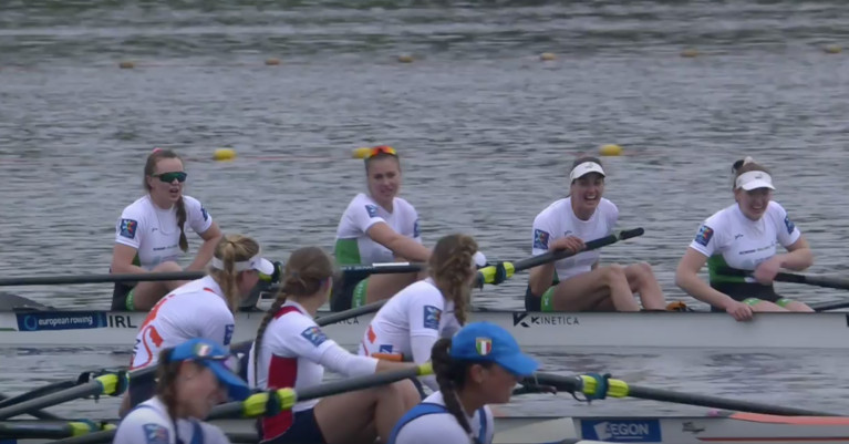 Ireland's women's four celebrate their silver with gold medallists the Netherlands 