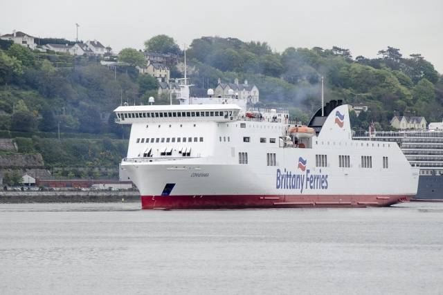 The chartered Connemara contributed to boosting Brittany Ferries Cork-Roscoff (Ireland-France) route as the operators strongest performing of the company's network of 12 routes that collectively also links those between the UK, France and Spain. AFLOAT adds the Cypriot flagged Connemara arriving to Cork (Ringaskiddy). In the background the stern of a Cunard Line 'Vista' class cruiseship that called to Cobh. 