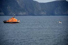Achill&#039;s all-weather lifeboat Sam and Ada Moody tows a stricken cabin boat Purteen Harbour