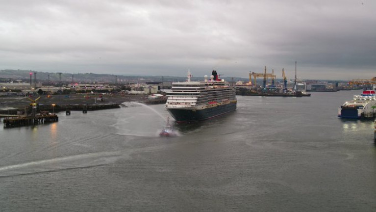 Queen Elizabeth, became the the 1000th cruise ship to visit Belfast Harbour where a tug led the traditional precession of water cannons on display yesterday evening. The Cunard Line &#039;Vista&#039; class ship departed the port for the sixth, and final time this season