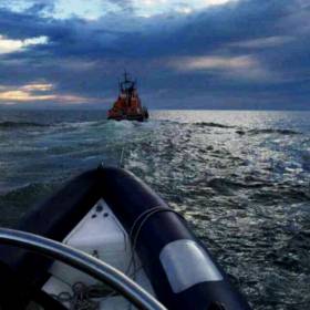 Donaghadee RNLI&#039;s all-weather lifeboat Saxon tows a RIB to safety  from the North Channel
