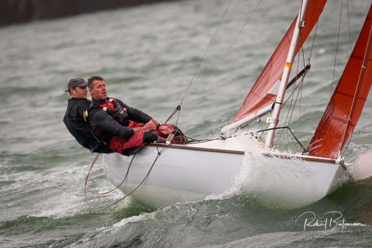 Ian Travers at the helm of a Squib in Kinsale