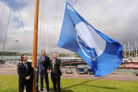 Flag raisers– (from left) Ian Diamond, An Taisce, Gavin Deane of Royal Cork and Senator Gerry Buttimer raise Royal Cork Marina&#039;s Blue Flag in Crosshaven yesterday