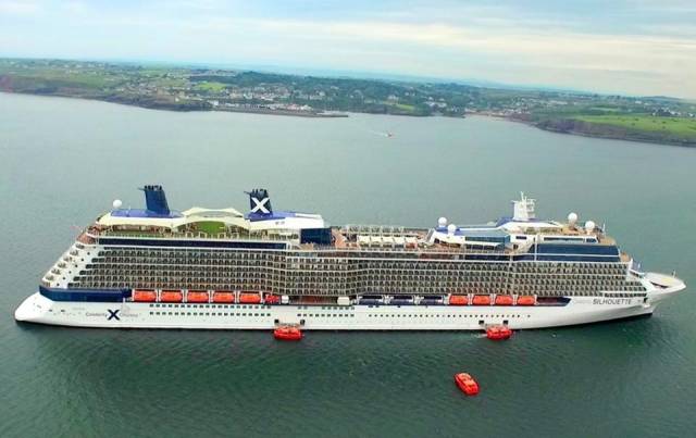Anchored off Dunmore East, Waterford Estuary on a previous call, Celebrity Silhouette, note the novel half-acre 'real' grass feature beneath the twin funnels. 