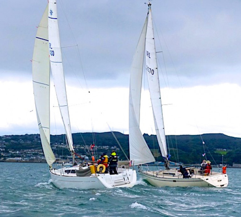 Mary Ellen (O’Byrne/Finucan/Carty HYC) and the vintage First 38 Out & About (Terry McCoy & Maurice Cregan, Skerries SC) neck and neck in the White Sails Division through the Sound towards the finish at Howth in the first race of the Fingal Cruiser Challenge