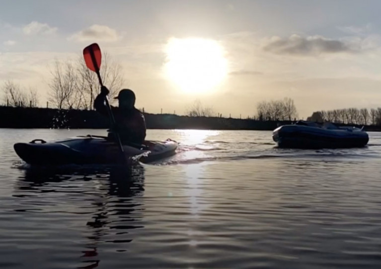 Kayaker John Medlow and his dinghy on the River Bann