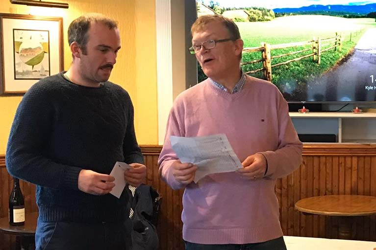 Ronan Wallace (left) collects his prize at WHSC